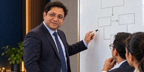 Business adviser presenting a plan to clients